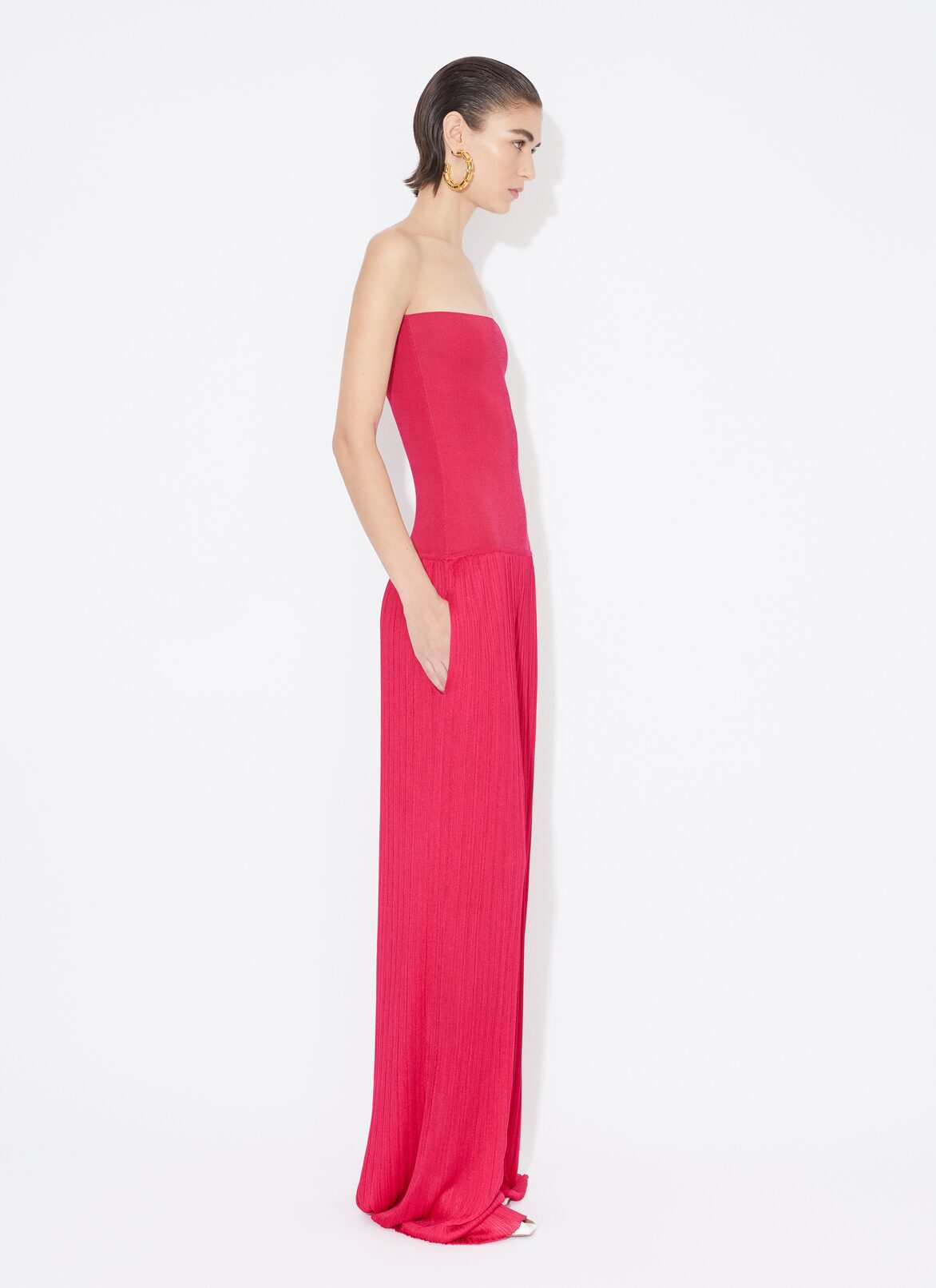 BUSTIER JUMPSUIT IN PLEATED KNIT ALAÏA PINK BUSTIER JUMPSUIT IN PLEATED KNIT